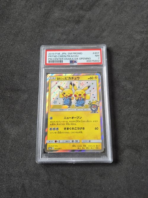 Carte PSA 7 NM Pretend Comedian Pikachu Pokemon Center Osaka DX Pokemon 407/SM-P